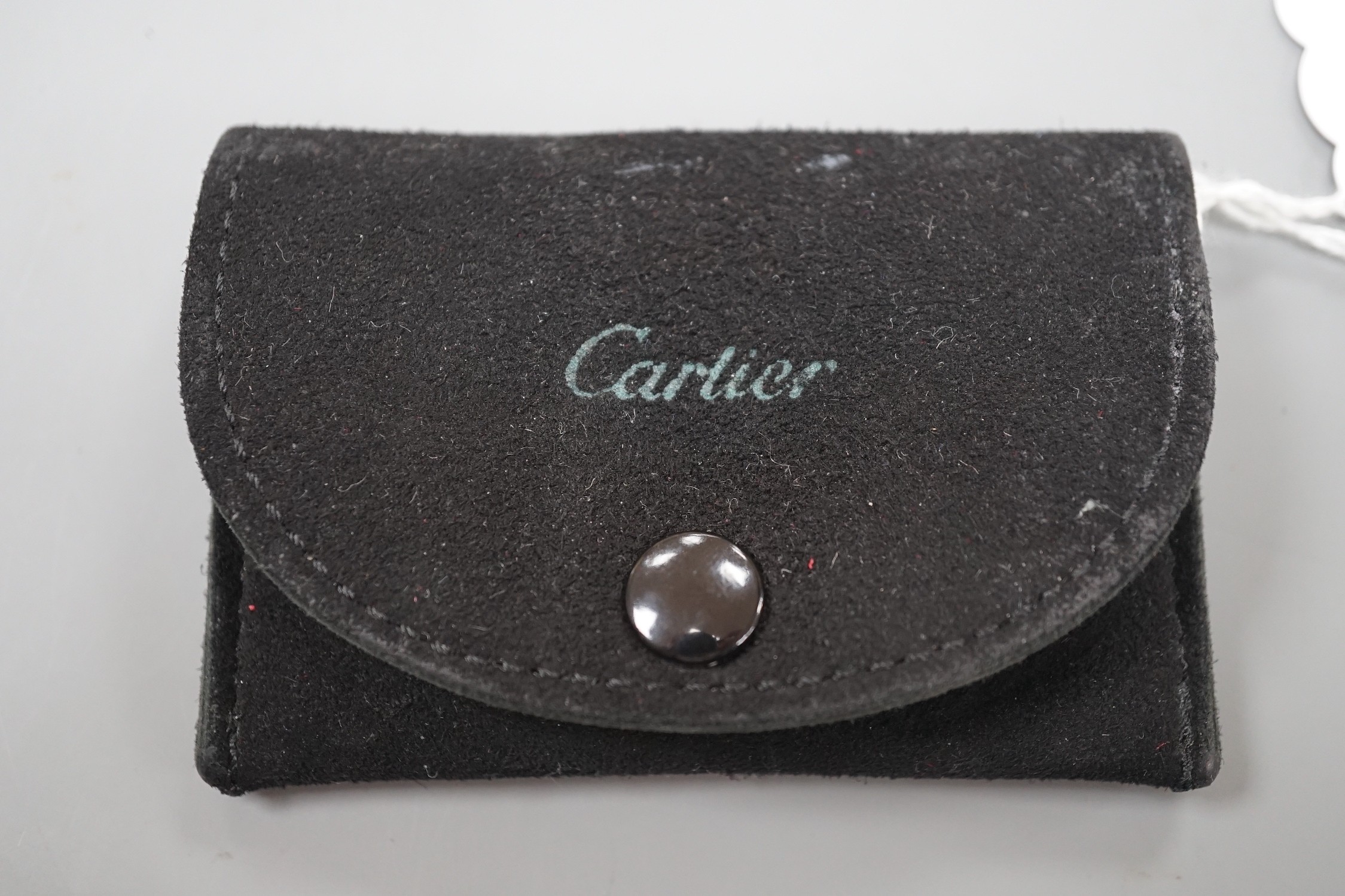 A modern pair of Cartier 750 yellow metal demi-lune cufflinks, each numbered 659650, 24mm, 12.5 grams, in Cartier pouch.